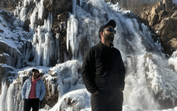 Snowy Drung Waterfall in Kashmir, an Instagramable winter destination with frozen cascades and scenic beauty.