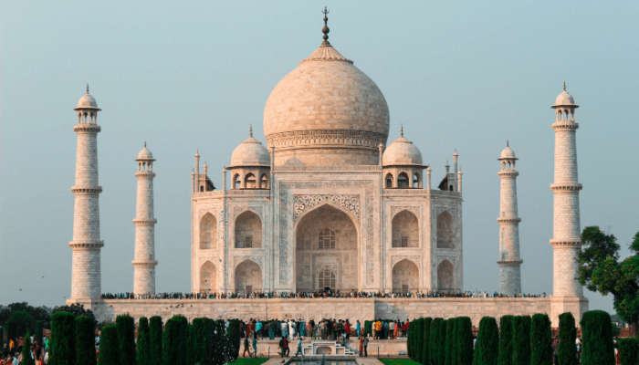 The Taj Mahal stands majestic in white marble, embodying love and Taj Mahal history